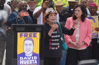 Dolores Huerta addresses the crowd after a weekend of unrest, as protests of ICE raids were broken up by law enforcement